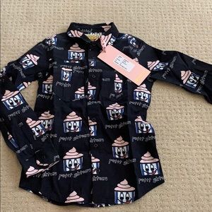 Hugo loves Tiki collared shirt. Size 8T